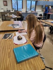 Students working with sugar beets